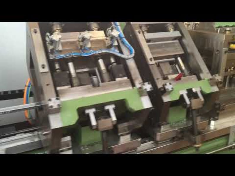 Automatic profiling line with cutting on the fly for the production of drawer guides