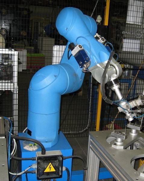 Robot for plastic component assembly